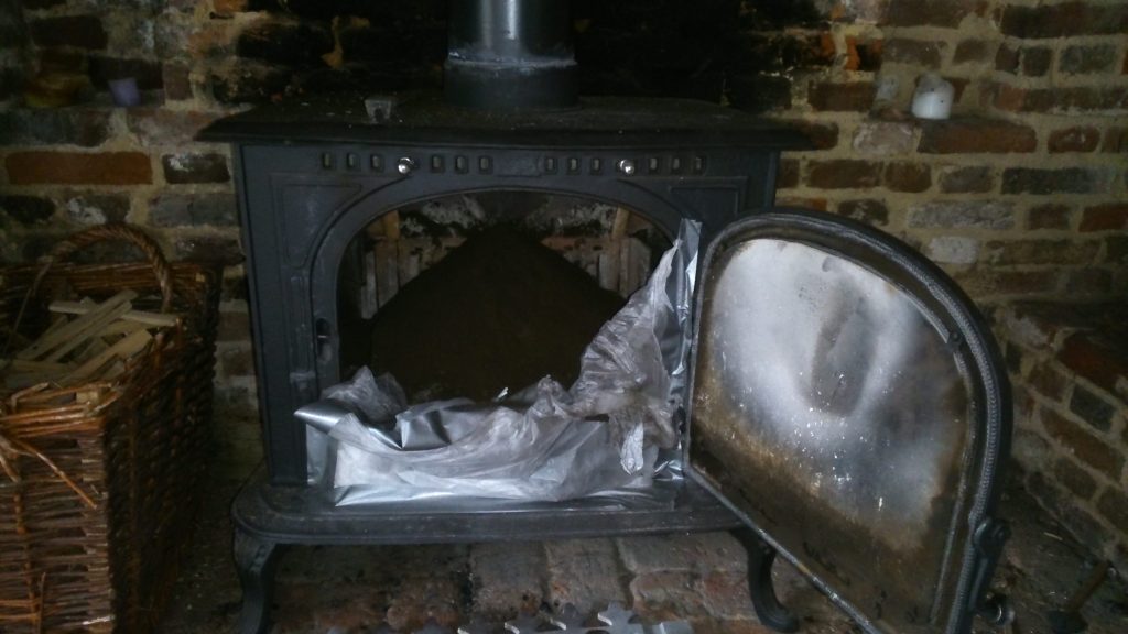 stove-full-of-soot-after-sweep